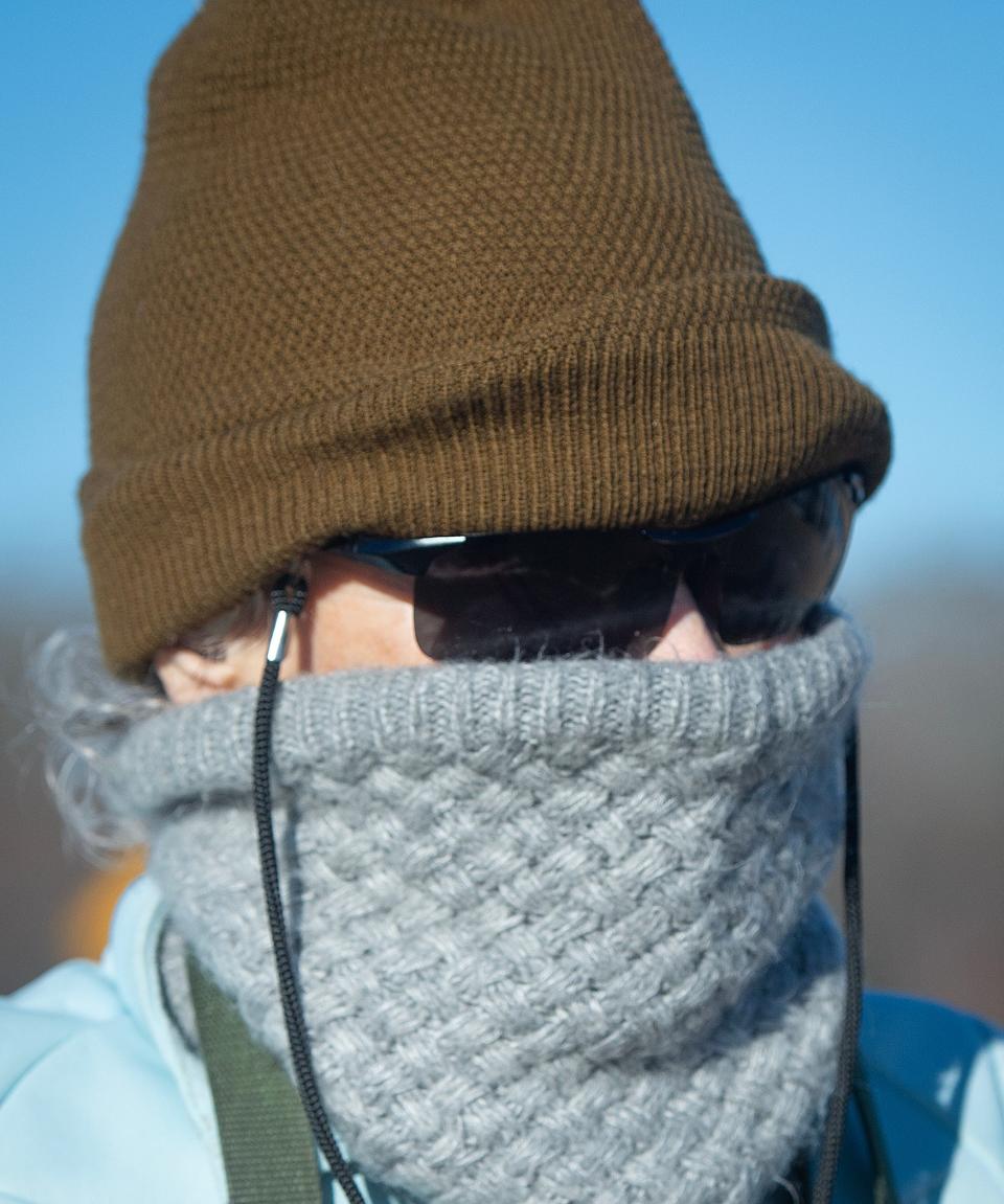 Ardell Hinton of Ridgeland dresses for the weather as she braves frigid temperatures to get out and run on Wednesday.
