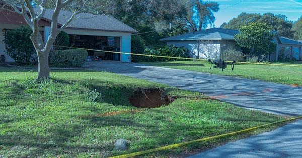 A sinkhole appeared in Highland City, Florida Saturday, Jan. 20, 2024. Reports show the family safely evacuated.