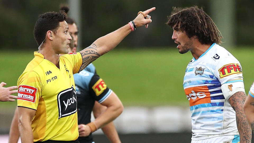 Kevin Proctor is pictured being sent off by referee Henry Perenara after allegedly biting Cronulla opponent Shaun Johnson.