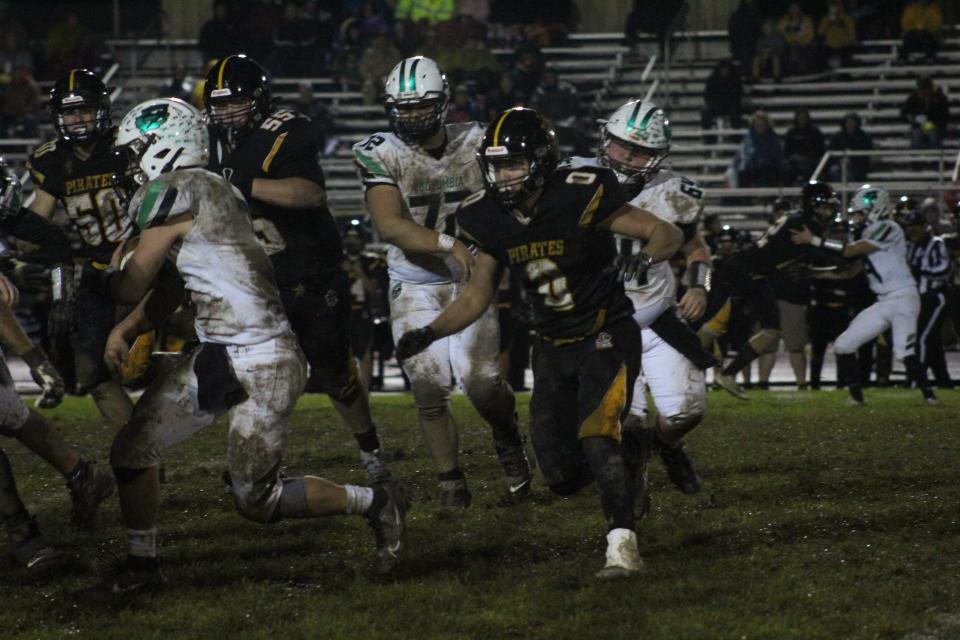 Black River defensive end Jonathan McKean chases down a Columbia player.