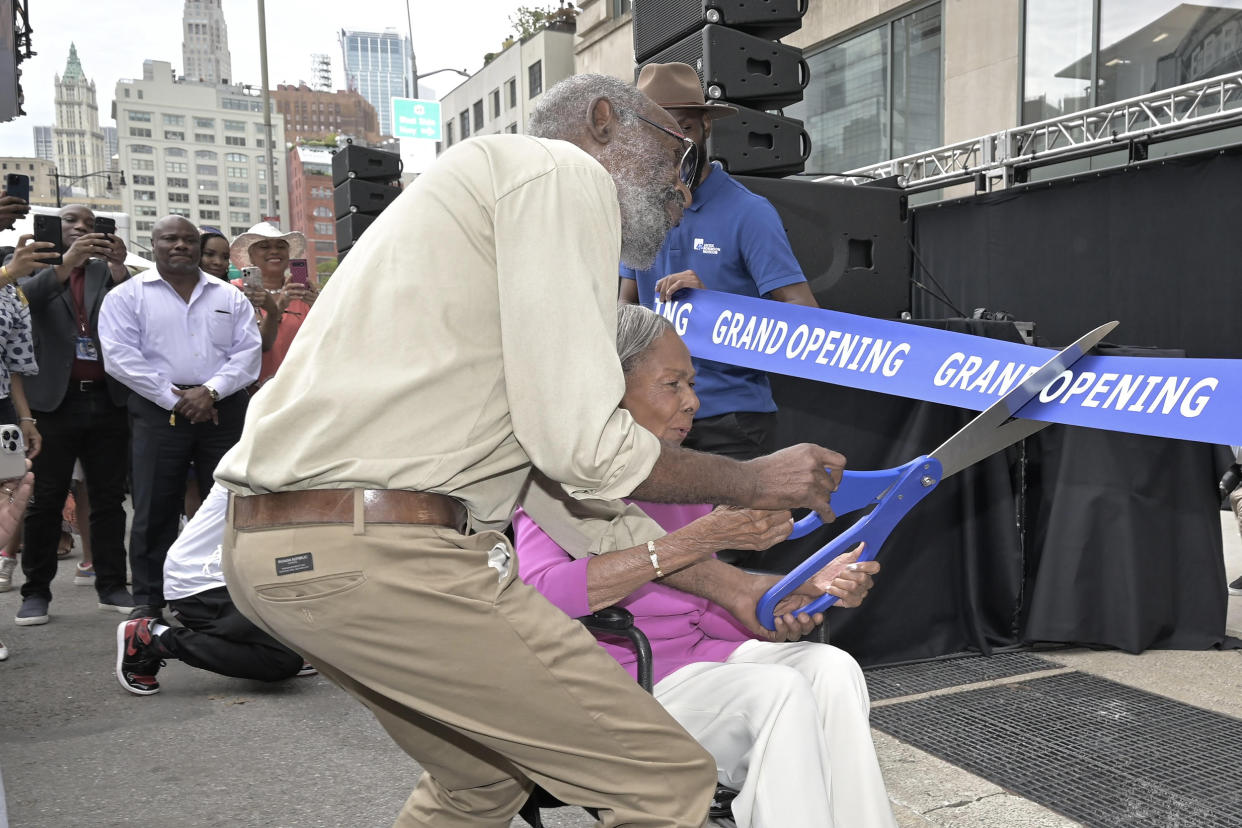 Jackie Robinson's son David and Jackie's widow, Rachel, cutting the ribbon at the Jackie Robinson Museum on Tuesday. (Jackie Robinson Foundation)