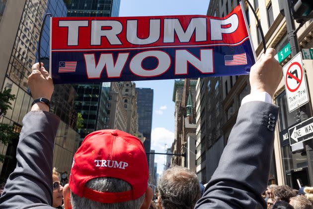 The morning after Donald Trump was convicted in Manhattan Criminal Court in the hush money trial, the former president's supporters, detractors, along with media and tourists, crowd the streets of 5th Avenue outside of Trump Tower on May 31 in New York City.