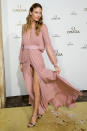 <p><strong>29 September</strong> Martha Hunt also opted for dusty pink, pairing her elegant dress with metallic sandals.</p>