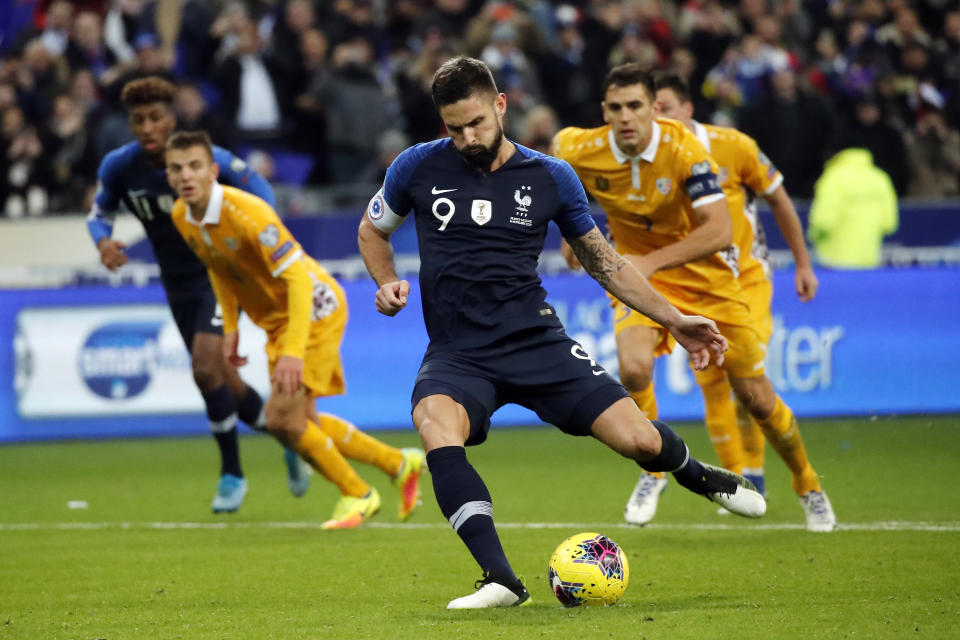 France's Olivier Giroud scores a penalty during the Euro 2020 group H qualifying soccer match between France and Moldova at the Stade de France stadium, in Saint Denis, north of Paris, Thursday, Nov. 14, 2019. (AP Photo/Francois Mori)