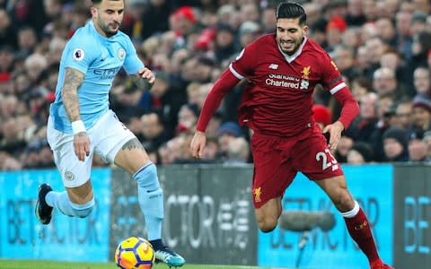 Emre Can battles for the ball with Kyle Walker - Credit: GETTY IMAGES