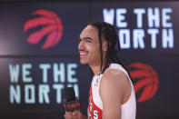 Toronto Raptors' Dalano Banton speaks to media at Scotiabank Arena during the NBA basketball team's media day in Toronto, Monday, Sept. 27, 2021. (Cole Burston/The Canadian Press via AP)