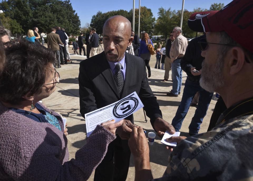 Television personality Montel Williams signs autographs for supporters of a ballot measure that would legalize medical marijuana in the state at the Arkansas state Capitol in Little Rock, Ark., Thursday, Oct. 18, 2012. (AP Photo/Danny Johnston)