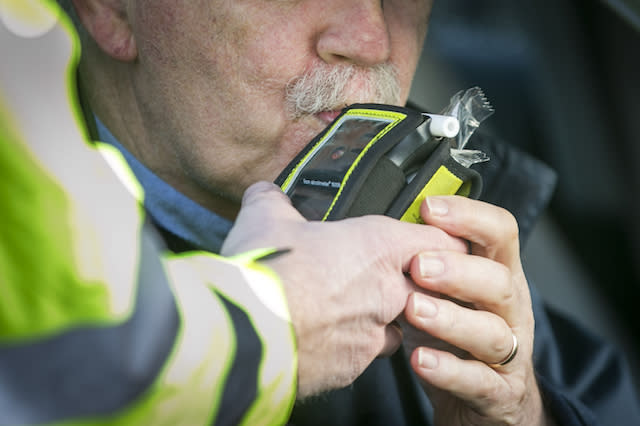 File photo dated 21/12/16 of a driver blowing into a breathalyser. Police have launched a summer crackdown on the &quot;menace&quot; of drink and drug driving.