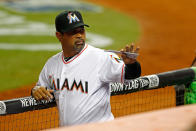 MIAMI, FL - APRIL 04: Manager Ozzie Guillen #13 of the Miami Marlins waves during Opening Day against the St. Louis Cardinals at Marlins Park on April 4, 2012 in Miami, Florida. (Photo by Mike Ehrmann/Getty Images)