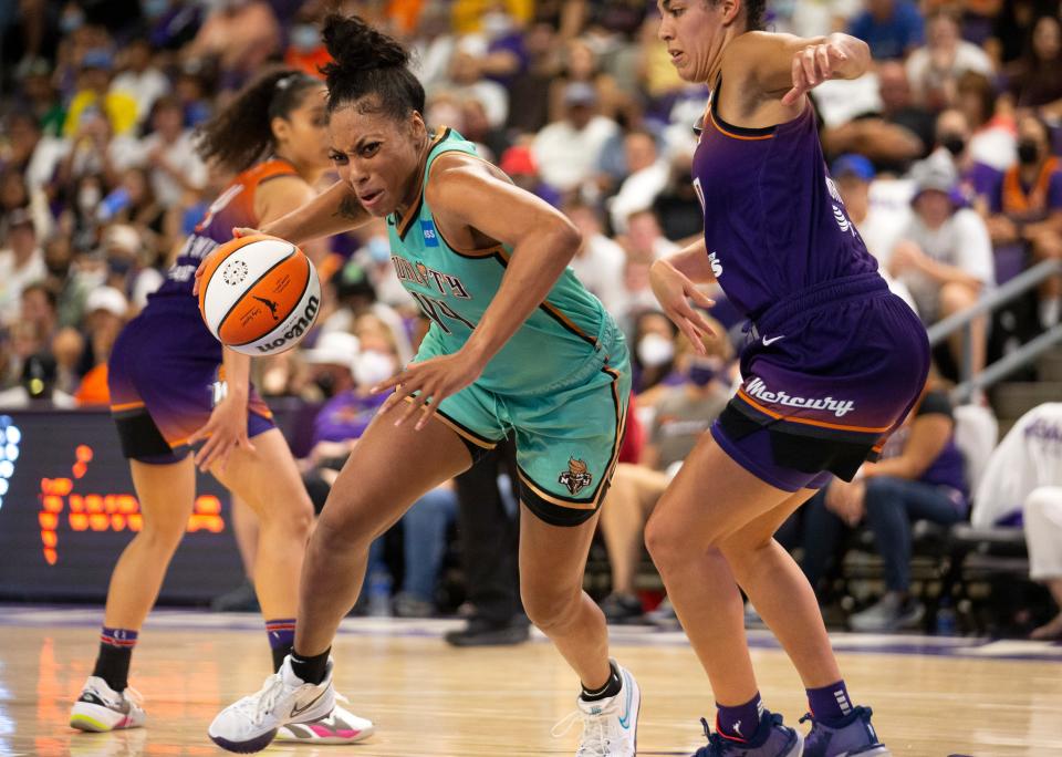 The Liberty's Betnijah Laney drives to the basket as Mercury guard Kia Nurse defends during the third quarter of the first round WNBA play-off game at Grand Canyon University in Phoenix on September 23, 2021.The Mercury won the game 83-82 and advance to the next round.