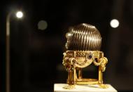 A Faberge egg is seen displayed during a photo-call at antique dealer Wartski, in central London April 7, 2014. The $20 million egg, hailing from the court of imperial Russia, was bought in a U.S. junk market by a scrap metal dealer, before it was acquired by Wartski for an unidentified private collector. It will be on display at Wartski's in London for four days in April. REUTERS/Olivia Harris (BRITAIN - Tags: ENTERTAINMENT BUSINESS SOCIETY)