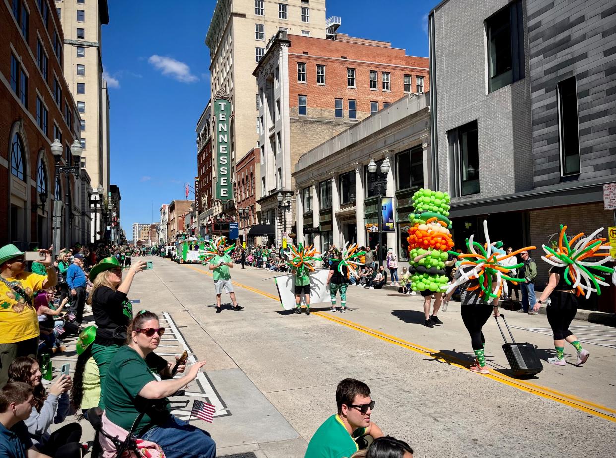 On a perfect day for it, crowds line Gay Street for the recent St. Patrick's Day parade.