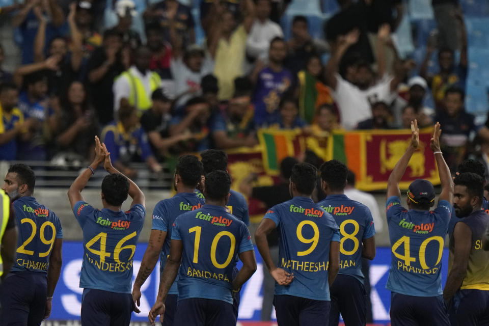 Sri Lankan players acknowledge the applause from the crowd after their win in the T20 cricket match of Asia Cup between Sri Lanka and India, in Dubai, United Arab Emirates, Tuesday, Sept. 6, 2022. (AP Photo/Anjum Naveed)