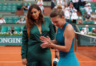 Tennis - French Open - Roland Garros, Paris, France - May 31, 2018 Marion Bartoli interviews Romania's Simona Halep after winning her second round match against Taylor Townsend of the U.S. REUTERS/Charles Platiau