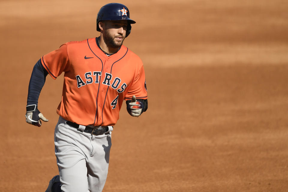 LOS ANGELES, CALIFORNIA - OCTOBER 06: George Springer #4 of the Houston Astros rounds the bases after hitting a home run against the Oakland Athletics during the fifth inning in Game Two of the American League Division Series at Dodger Stadium on October 06, 2020 in Los Angeles, California. (Photo by Kevork Djansezian/Getty Images)