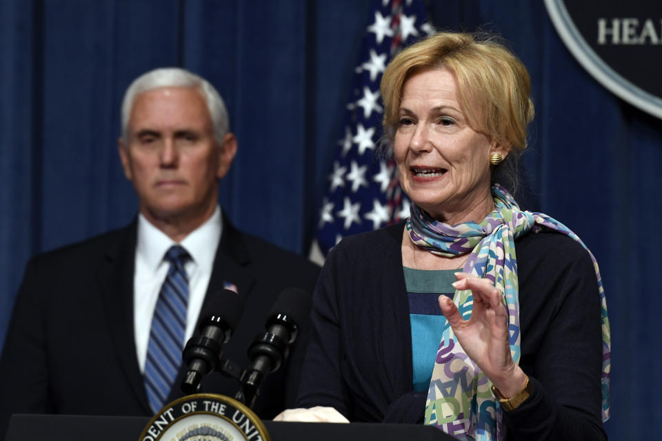 Vice President Mike Pence, left, listens as Dr. Deborah Birx, White House coronavirus response coordinator, right, speaks during a news conference with members of the Coronavirus task force at the Department of Health and Human Services in Washington, Friday, June 26, 2020. (AP Photo/Susan Walsh)