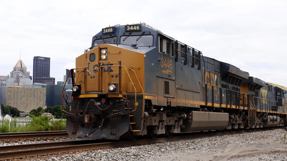 A CSX freight train rolls past downtown Pittsburgh on Monday, June 24, 2019. (AP Photo/Gene J. Puskar)