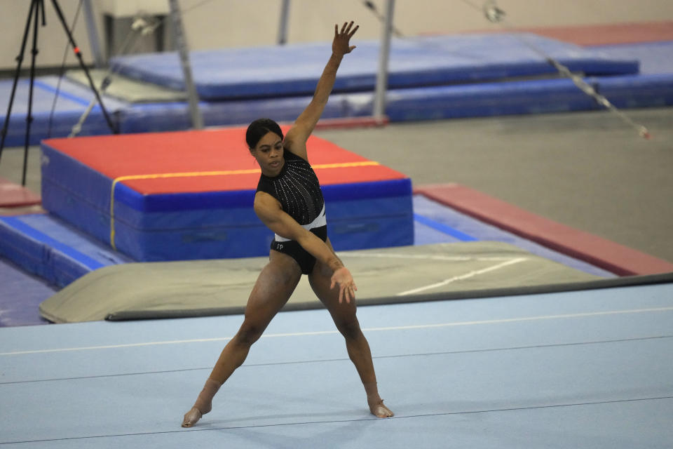 Gabby Douglas performs her floor routine while competing at the American Classic Saturday, April 27, 2024, in Katy, Texas. (AP Photo/David J. Phillip)