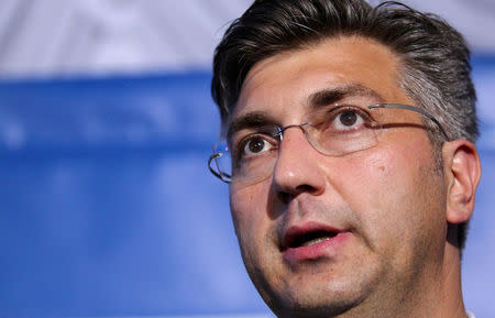 FILE PHOTO: Andrej Plenkovic, president of the Croatian Democratic Union (HDZ), speaks after exit polls in Zagreb, Croatia, September 11, 2016. REUTERS/Antonio Bronic/File Picture