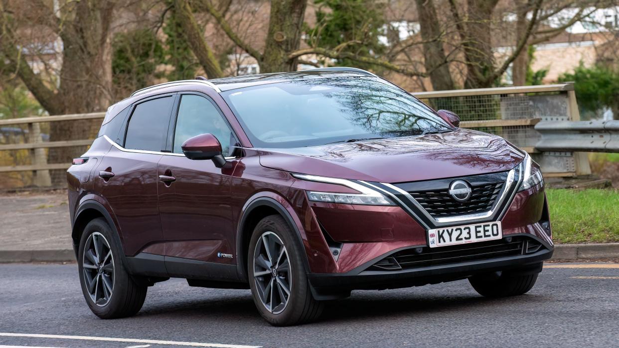 Milton Keynes,UK 31st jan 2024. 2023 Nissan Qashqai tekna e-power hybrid electric  car travelling on an English road