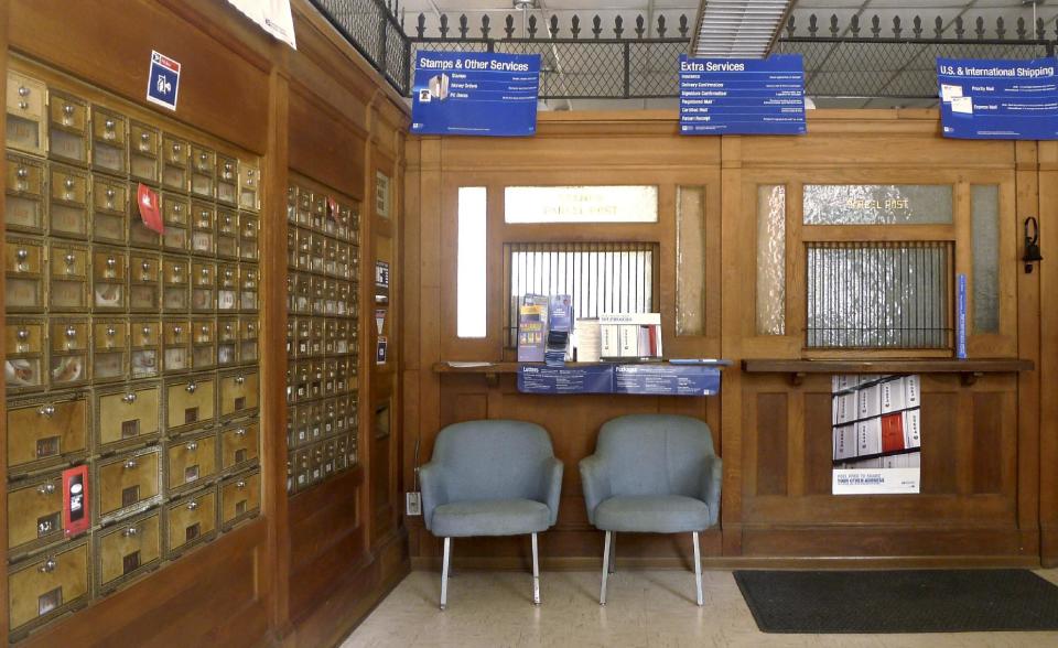 This Saturday, Sept. 17, 2011 photo shows the local post office in Markham, Va. The financially struggling U.S. Postal Service sought Wednesday, May 9, 2012 to tamp down concern over wide-scale cuts, revealing it will seek to keep thousands of rural post offices open with shorter hours. Under the emerging strategy, no post office would be closed. But more than 13,000 rural mail facilities could see reduced operations of between two and six hours. (AP Photo/J. Scott Applewhite)