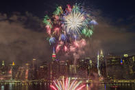 <p>With the New York City skyline in the background, fireworks explode during an Independence Day show over the East River, Tuesday, July 4, 2017, in New York. (AP Photo/Andres Kudacki) </p>