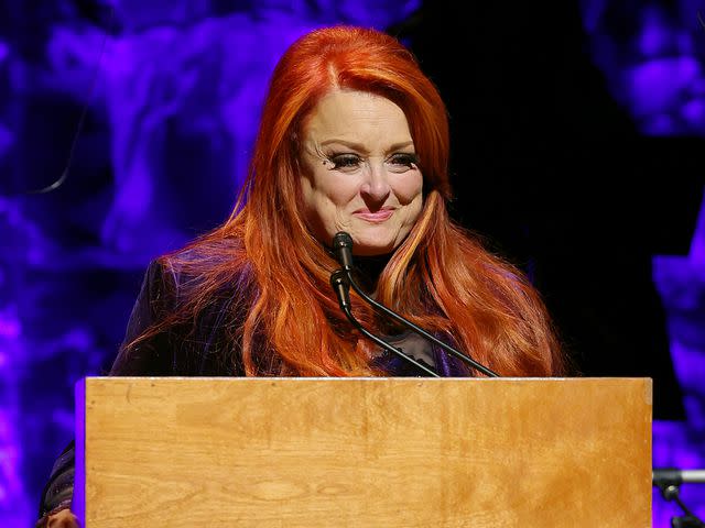 <p>Terry Wyatt/Getty</p> Wynonna Judd speaks onstage for the class of 2021 medallion ceremony at Country Music Hall of Fame and Museum in Nashville, Tennessee.