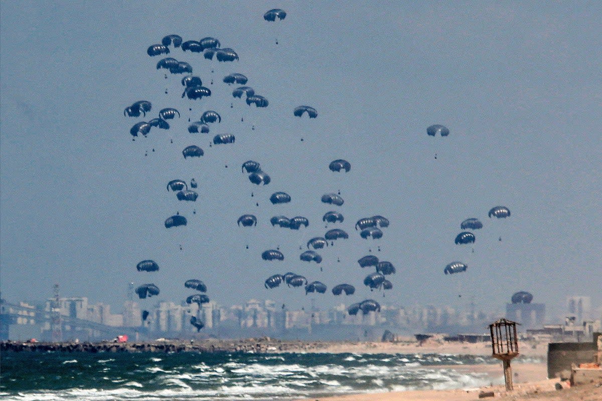 Humanitarian aid is dropped on the Gaza Strip, west of Gaza Cit (AFP via Getty Images)