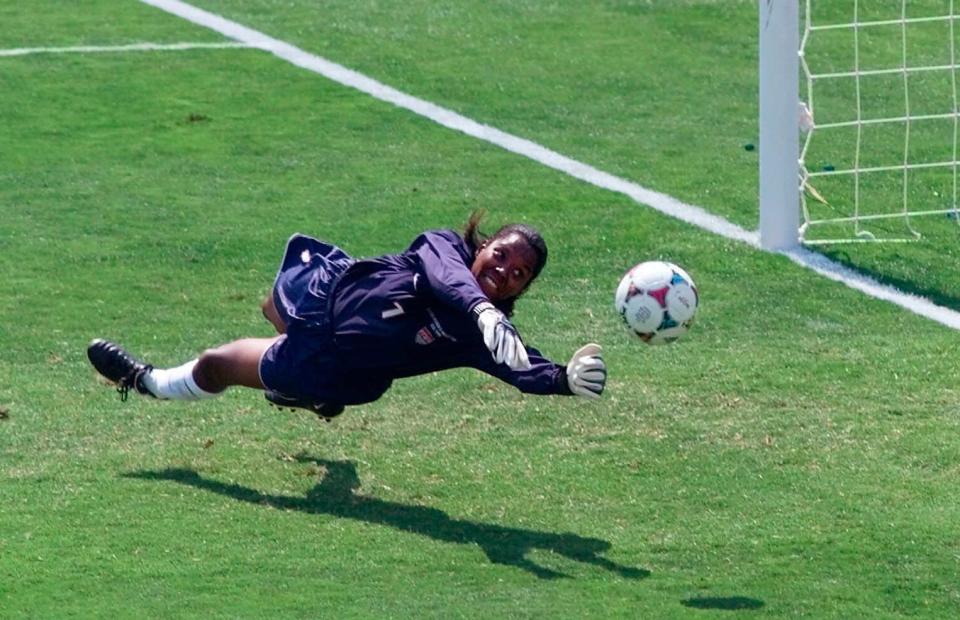 Briana Scurry blocks a penalty shootout kick by China's Ying Liu during overtime of the Women's World Cup Final at the Rose Bowl.