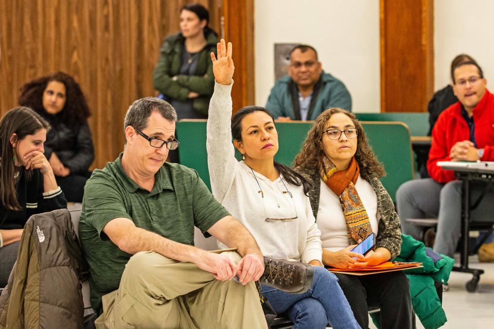 Parents asks for an explanations of Dr. Hugh Broomall, Deputy Superintendent at Red Clay Consolidated School District, during a parent meeting held at Marbrook Elementary School in Wilmington, Tuesday, Dec. 5, 2023. Red Clay is considering phasing out Spanish immersion instruction at the school.