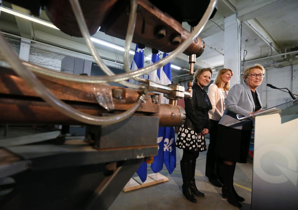 Parti Quebecois leader Pauline Marois speaks to the press at a campaign stop at a trade school in Montreal