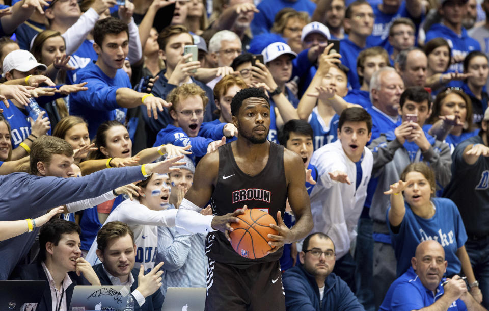 Brown's Tamenang Choh, pictured in 2019 in a game against Duke, is suing to put an end to the Ivy League's ban of athletic scholarships. (AP Photo/Ben McKeown)