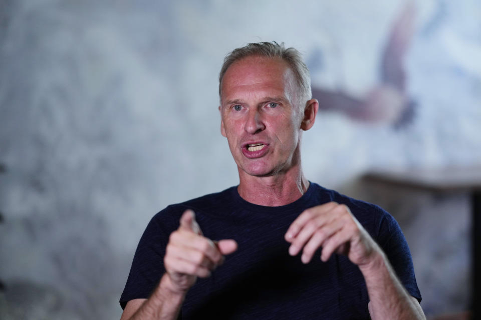 Former NHL goalkeeper Dominik Hasek gestures during an interview with The Associated Press in Prague, Czech Republic, Wednesday, June 28, 2023. The NHL great has been a prominent and vocal critic of the International Olympic Committee's recommendation that Russians and Belarusians could compete in international competitions after being approved as neutrals. (AP Photo/Petr David Josek)