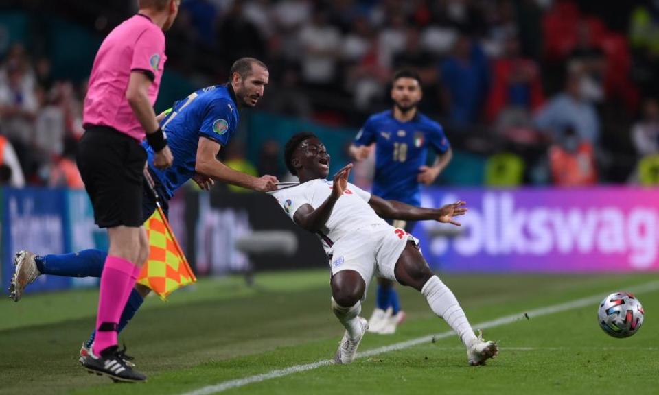 Giorgio Chiellini fouls Bukayo Saka during the Euro 2020 final at Wembley