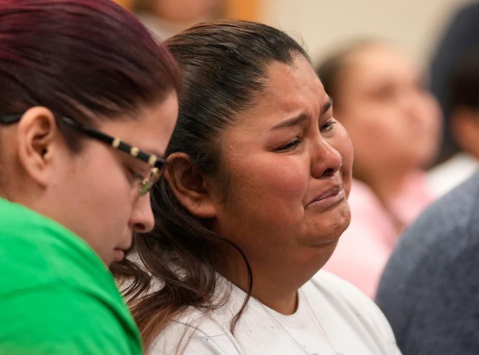 Felicha Martinez, mother of shooting victim Xaver Lopez, cries as she listens to U.S. Attorney General Merrick Garland speak at Thursday's news conference in Uvalde.