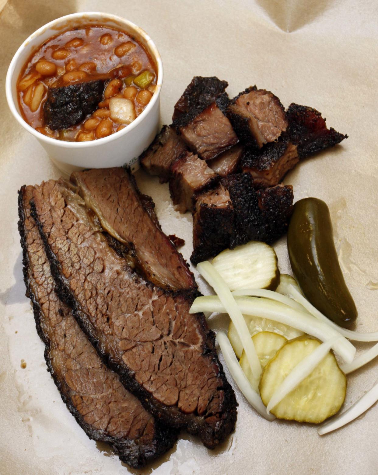 The burnt ends with brisket and beans is one of the popular choices at City Butcher in south Springfield.