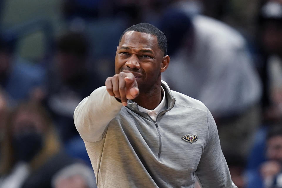 RETRANSMISSION TO CORRECT SURNAME TO GREEN - New Orleans Pelicans head coach Willie Green calls out from the bench in the second half of an NBA basketball game against the Philadelphia 76ers in New Orleans, Wednesday, Oct. 20, 2021. The 76ers won 117-97. (AP Photo/Gerald Herbert)