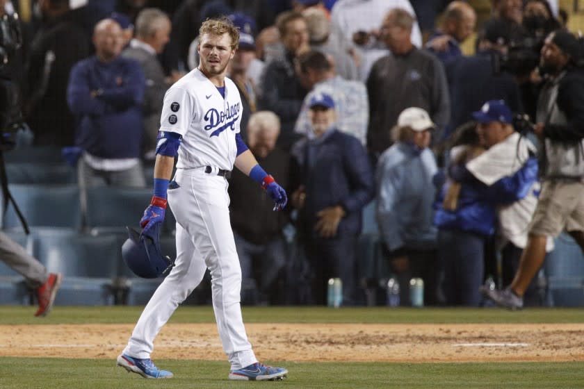 Los Angeles, CA - October 11: Los Angeles Dodgers' Gavin Lux reacts after a pop fly out to end game three of the 2021 National League Division Series against the San Francisco Giants at Dodger Stadium on Monday, Oct. 11, 2021 in Los Angeles, CA. The Giants won 1-0. (Gina Ferazzi / Los Angeles Times)