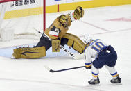 Vegas Golden Knights goaltender Marc-Andre Fleury (29) makes a save against St. Louis Blues center Brayden Schenn (10) during the second period of an NHL hockey game Saturday, May 8, 2021, in Las Vegas. (AP Photo/David Becker)