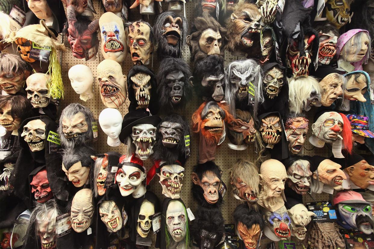 Halloween masks are offered for sale at Fantasy Costumes on October 28, 2011 in Chicago, Illinois.
