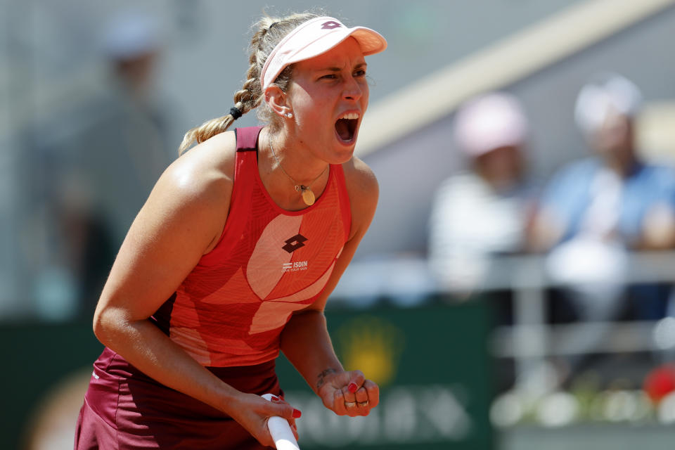 Belgium's Elise Mertens reacts after beating Jessica Pegula of the U.S. during their third round match of the French Open tennis tournament at the Roland Garros stadium in Paris, Friday, June 2, 2023. (AP Photo/Jean-Francois Badias)