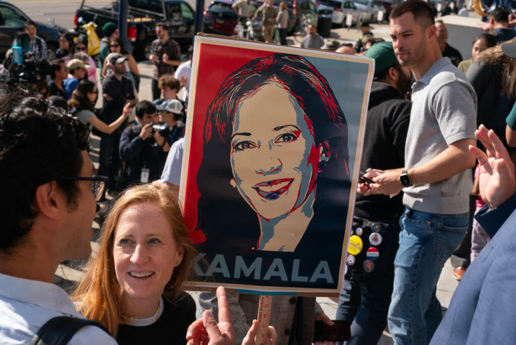 A supporter holds a sign as members of the San Francisco Democratic Party rally in support of Kamala Harris, following the announcement by President Joe Biden that he is dropping out of the 2024 presidential race, on July 22, 2024 at City Hall in San Francisco, California. Biden has endorsed Harris, the former San Francisco district attorney, to be the Democratic nominee. (Photo by Loren Elliott/Getty Images)
