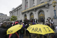 A crowd listens to speakers at a reparations rally outside of City Hall in San Francisco, Tuesday, March 14, 2023. Supervisors in San Francisco are taking up a draft reparations proposal that includes a $5 million lump-sum payment for every eligible Black person. (AP Photo/Jeff Chiu)