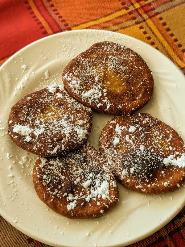 <p>Mochas and Mimosas</p><p>Caribbean Pumpkin Fritters. Sweet, tender and crispy pumpkin fritters make a delicious breakfast, dessert or snack.</p><p><strong>Get the recipe: <a href="https://mochasandmimosas.com/pumpkin-fritters-recipe/" rel="nofollow noopener" target="_blank" data-ylk="slk:Pumpkin Fritters Recipe;elm:context_link;itc:0;sec:content-canvas" class="link rapid-noclick-resp">Pumpkin Fritters Recipe</a></strong></p>