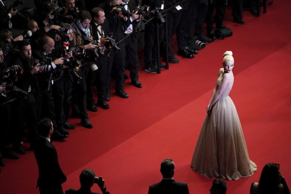 Anya Taylor-Joy poses for photographers upon departure from the premiere of the film 'Furiosa: A Mad Max Saga' at the 77th international film festival in Cannes.