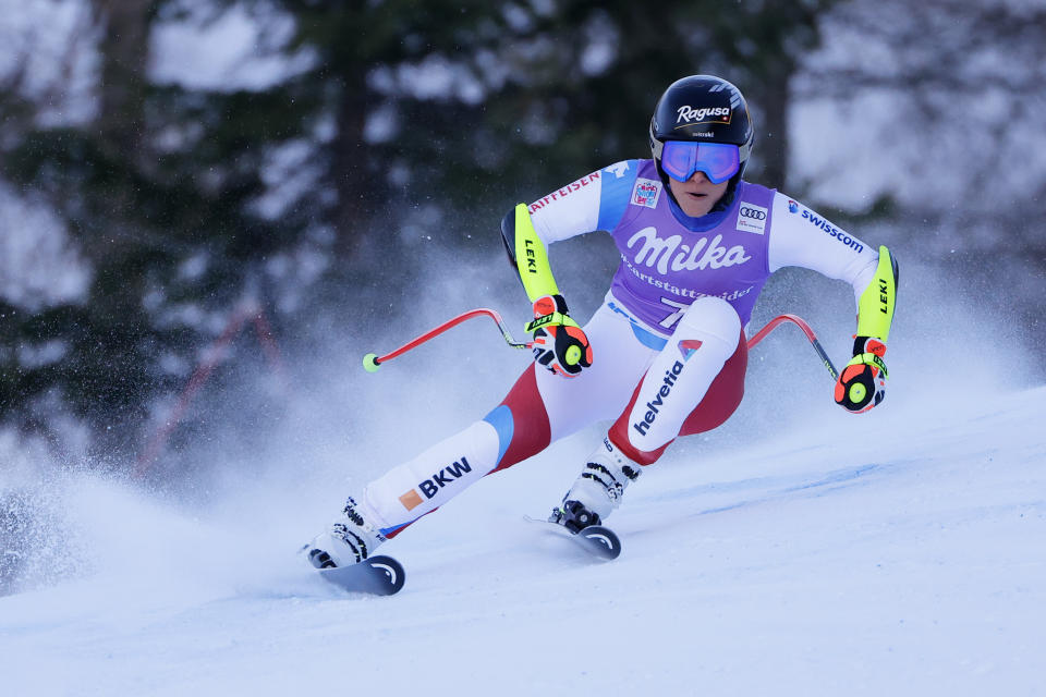 Switzerland's Lara Gut Behrami speeds down the course during an alpine ski, women's World Cup super-G race in Zauchensee, Austria, Sunday, Jan. 16, 2022. (AP Photo/Giovanni Maria Pizzato)