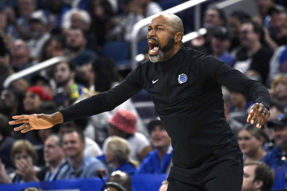 Orlando Magic head coach Jamahl Mosley calls instructions during the first half of an NBA basketball game against the Detroit Pistons, Sunday, March 3, 2024, in Orlando, Fla. (AP Photo/Phelan M. Ebenhack)