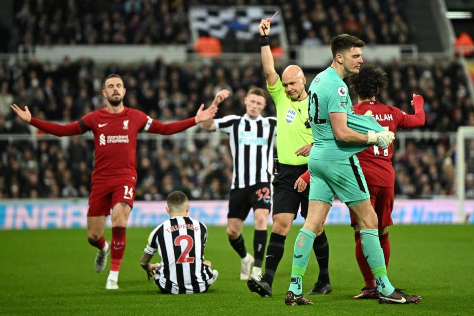 Nick Pope is sent off after handling the ball outside the box (AFP via Getty Images)