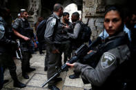 Israeli security forces stand at the site where an Israeli was wounded in a stabbing attack in Jerusalem's Old City, Israeli Police said, March 18, 2018. REUTERS/Ammar Awad