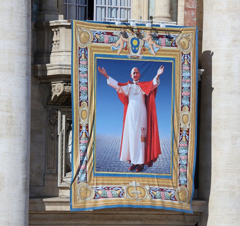 A tapestry of Pope Paul VI is unveiled during a beatification ceremony at St. Peter's Basilica in Vatican City near Rome on October 19, 2014. On Aug. 22, 1968, Pope Paul VI arrived in Colombia, becoming the first pontiff to visit South America. File Photo by David Silpa/UPI